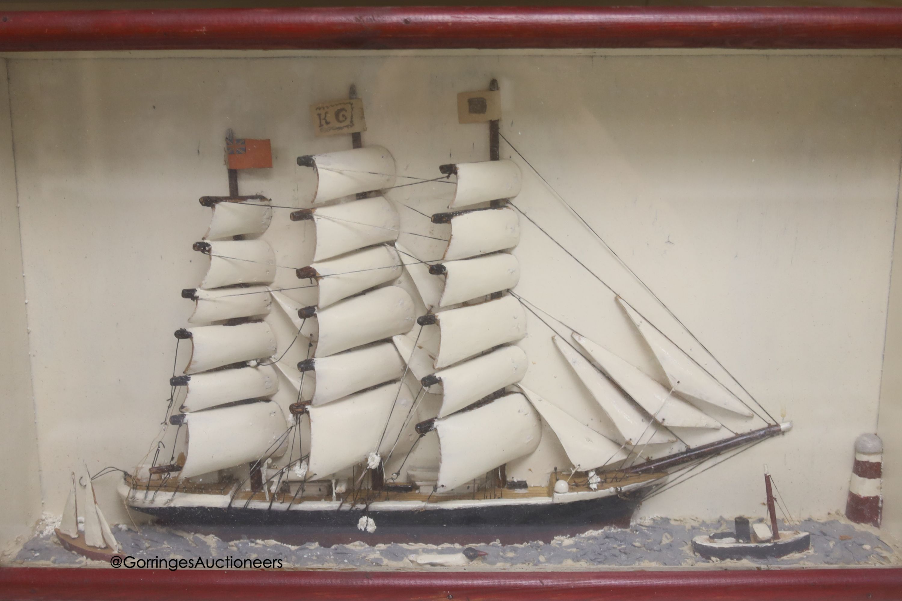 A Waterline ship diorama, glazed cabinet, 32 x 55cm